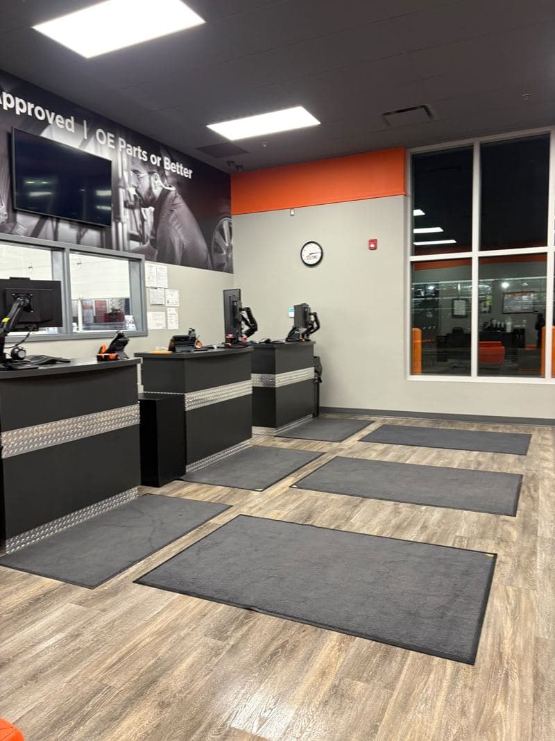Service desks and entrance mats on a freshly cleaned floor